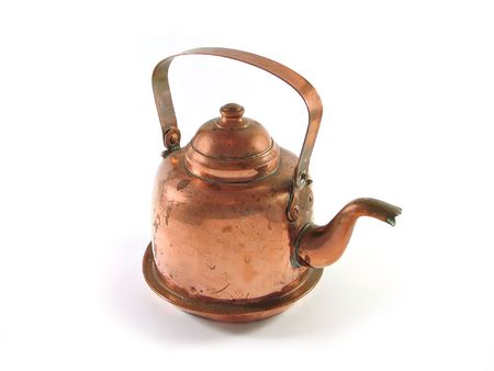 Antique copper brass kettle isolated on whiteの写真素材