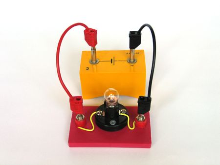 Demonstration of a light bulb in a simple electrical circuitの写真素材