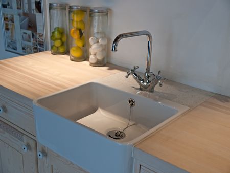 Details of modern classical design kitchen sink with water tap の写真素材