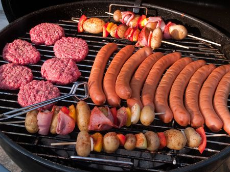 Summer Barbecue BBQ grill party with selection of meatの写真素材