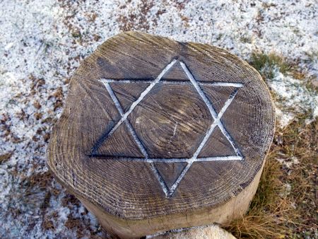 Star of David engraved in wood - symbol of Judaismの写真素材