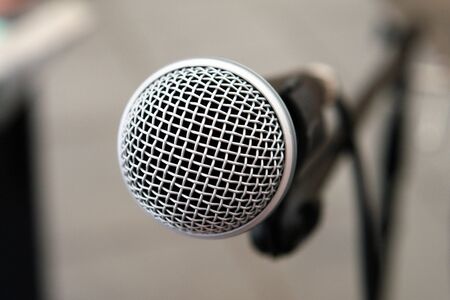 Microphone on stage in closeup view great show business background image       の写真素材