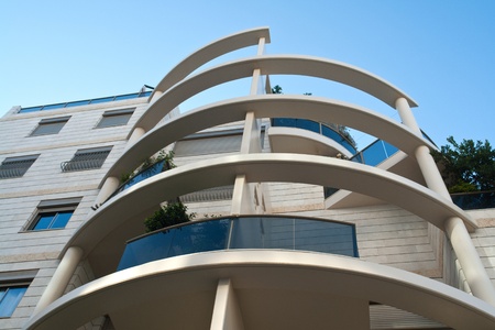 Modern design luxurious executive apartments city condominium building with green gardensのeditorial素材