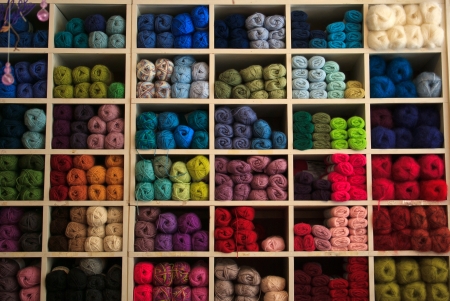 Selection of coloful yarn wool on display in a shopの写真素材