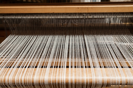 Hand loom in front view - All strings attached - Textile abstractの写真素材