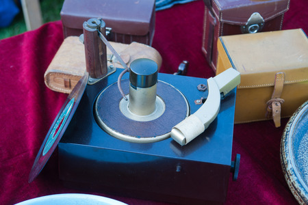 An old vintage record player for sale in a flea marketの写真素材
