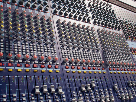 Sound audio mixer control system console in close up detailed view