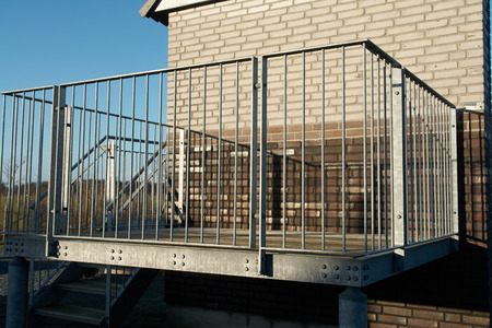Modern design metal iron balcony in close viewの写真素材