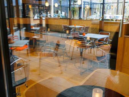 Modern Classical Design Coffee Shop Cafe Restaurant Interior via Blurred Window Imageのeditorial素材