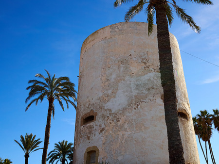 Famous attractive tourist attraction Torre Vigia Berber pirate watchtower Cabo Roig Orihuela Costa  Spainのeditorial素材
