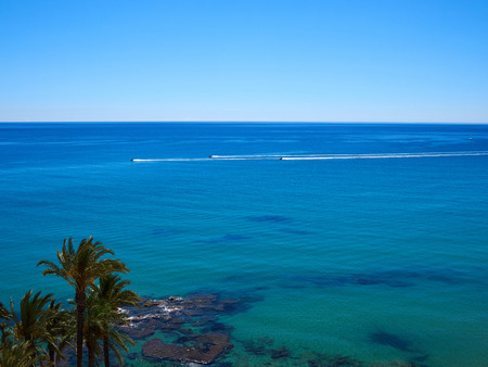 Three Jet ski sea scooters in full speed  Costa Blanca shore Spainの写真素材