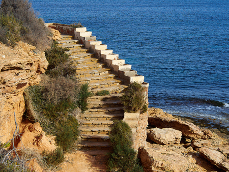 Famous promenade of Cabo Roig. Costa Blanca. Spain great summer travel destinationの写真素材