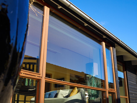 Details low angle view of modern style designed private wooden home summer house