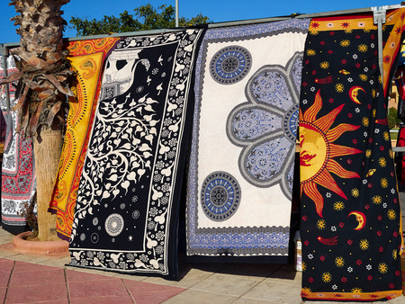 Beautiful colorful handmade Indian style fabrics textile material in street market shop display