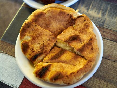 Pita bread roasted with garlic traditional and typical in the Arabic Middle East cuisineの写真素材