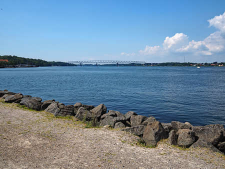 Old Little Belt Bridge and small town of Middelfart Denmark Scandinavia travel destinationの写真素材