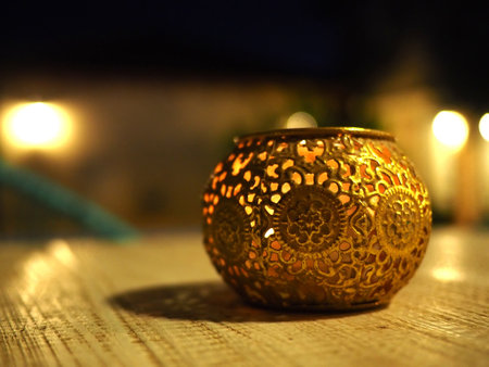 Decorative Oriental Middle East style candle holder on a dining table to create special atmosphere
