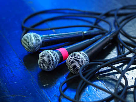 Closeup of classic microphone at concert on stage with shallow depth of field