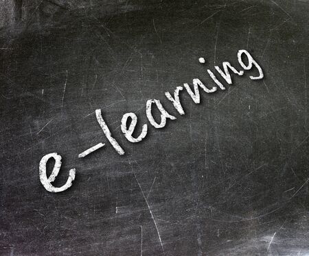 E-learning school written on a chalkboard                     の写真素材