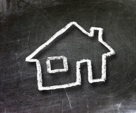 hand-drawn house on a chalkboard                   の写真素材