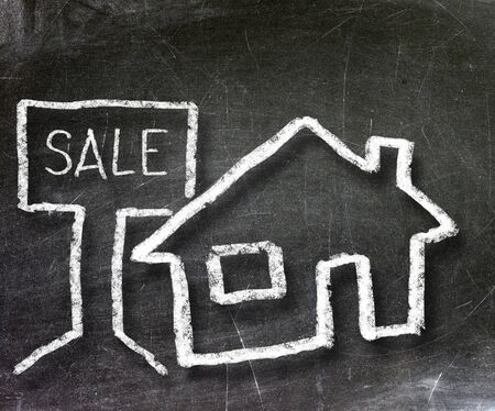 hand-drawn house on a chalkboard                     の写真素材