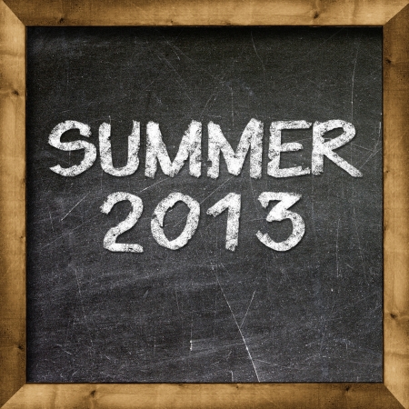 Summer 2013 handwritten with white chalk on a blackboard の写真素材
