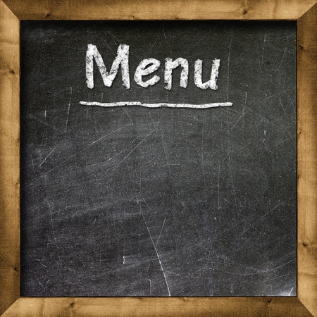 Menu title written with chalk on blackboardの写真素材