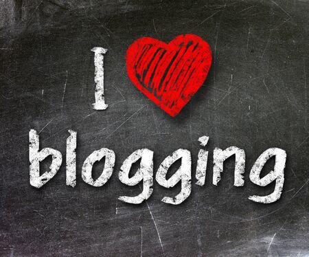 I love my blog handwritten with white chalk on a blackboard                   の写真素材