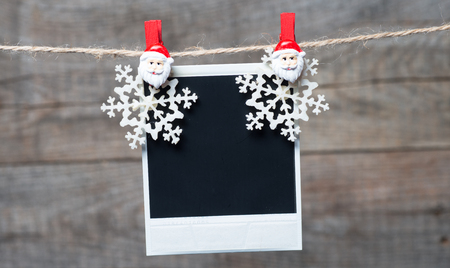 Old pictures on wood background with Christmas decorationの写真素材