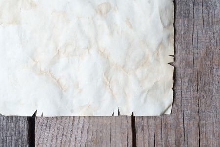 Vintage background with old paper on wooden backgroundの写真素材