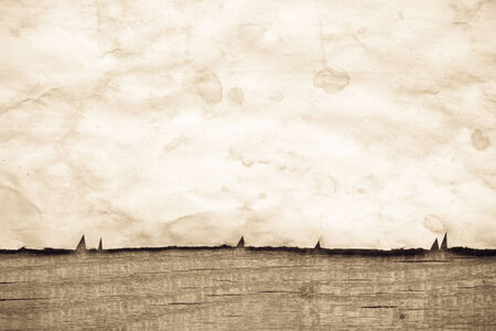 Vintage background with old paper on wooden backgroundの写真素材