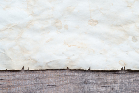 Vintage background with old paper on wooden backgroundの写真素材