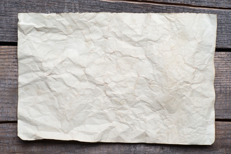 Vintage background with old paper on wooden background の写真素材