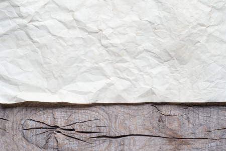 Vintage background with old paper on wooden background の写真素材