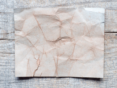 Vintage background with old paper on wooden background の写真素材