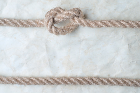 Ropes and old vintage ancient paper background の写真素材