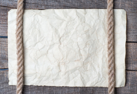 Ropes and old vintage ancient paper background の写真素材