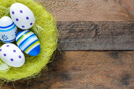 Colorful Easter egg in nestの写真素材