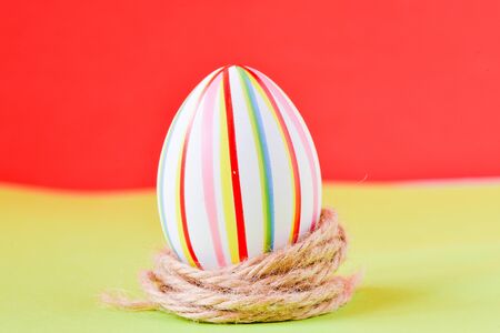 Colorful Easter egg in nestの写真素材