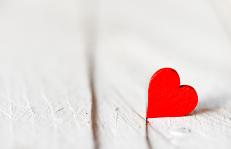 Heart on a wooden background. Background in the style of Valentine's Day. Heart on a wooden backgroundの写真素材