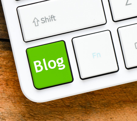 Blog. Computer Keyboard with the words blog on green buttonの写真素材