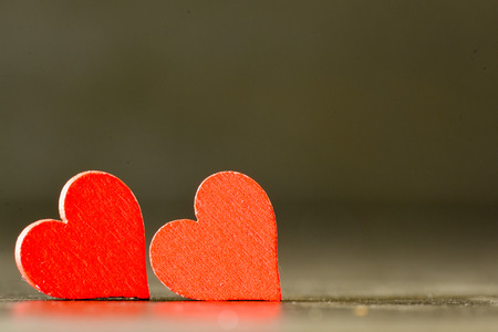Red hearts on black background. Valentine`s concept background.の写真素材