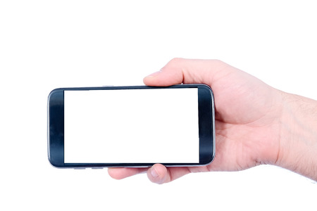 Touch screen smartphone in a handの写真素材