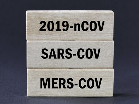 2019-nCOV, SARA-COV, MERS-COV words on wooden blocksの写真素材