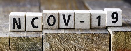 VIRUS word arranged from wooden lettersの写真素材