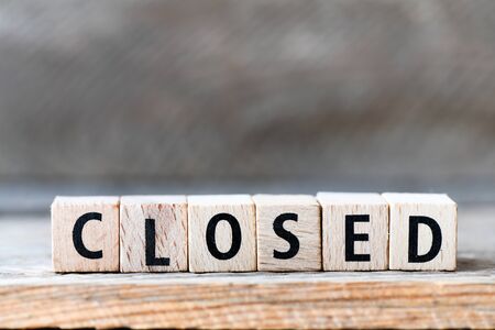 CLOSED. Word arranged from wooden letters Closed.の写真素材