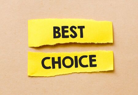 BEST CHOICE words on yellow cards and wooden table.の写真素材