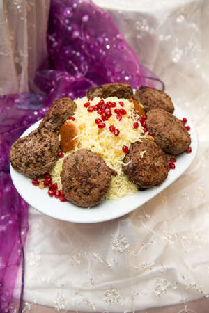 Azerbaijani national cuisine rice with raisins and fish cutlets