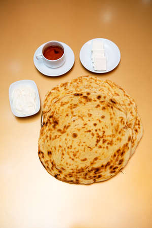 Dish of Azerbaijani national cuisine puff bread cream