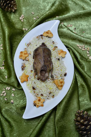 Rice with roasted wild duck hunting trophy stuffed duck